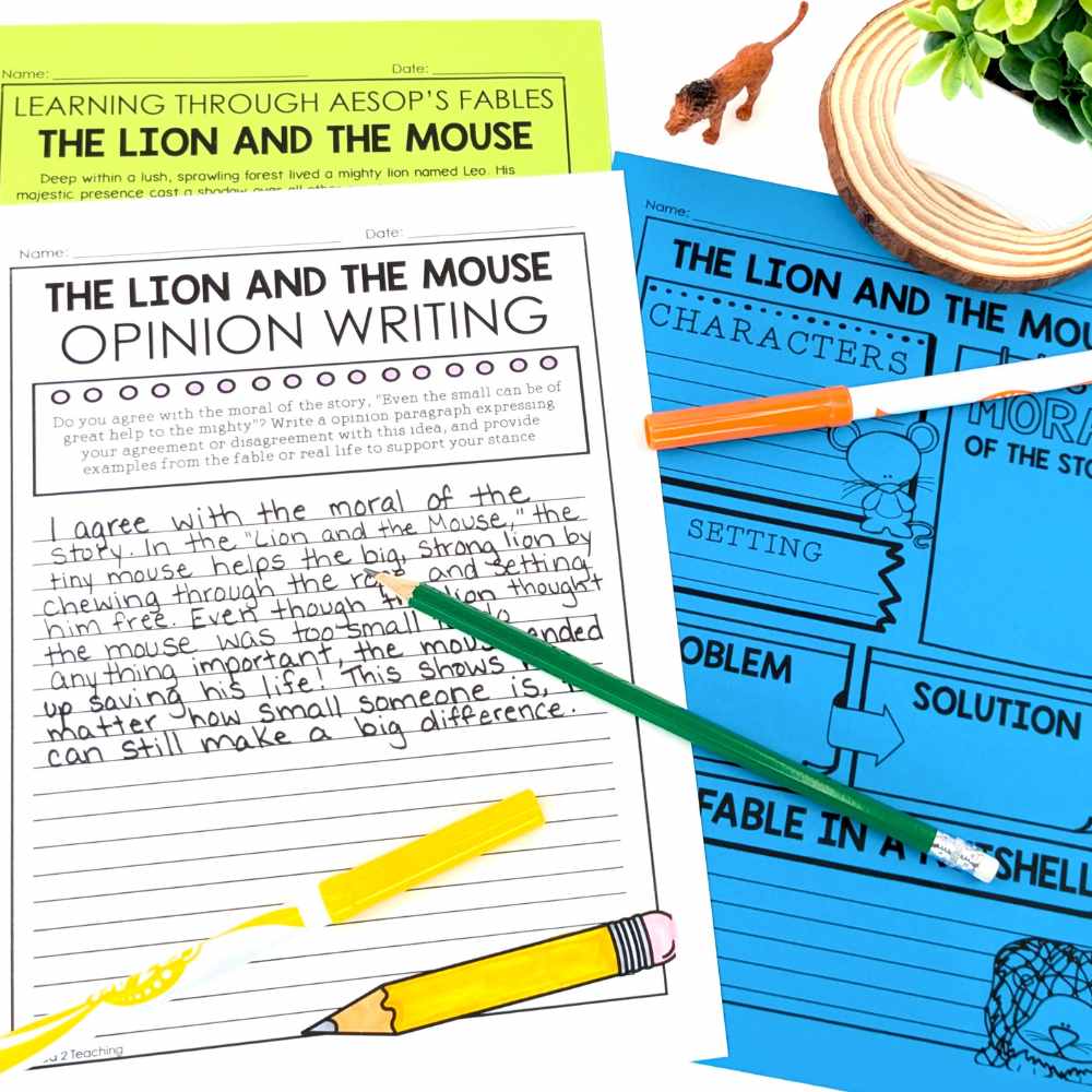 Aseop's Fables Unit and Writing Activities with The Lion and the Mouse Fable and Writing Assignment Sitting on Student Desk.